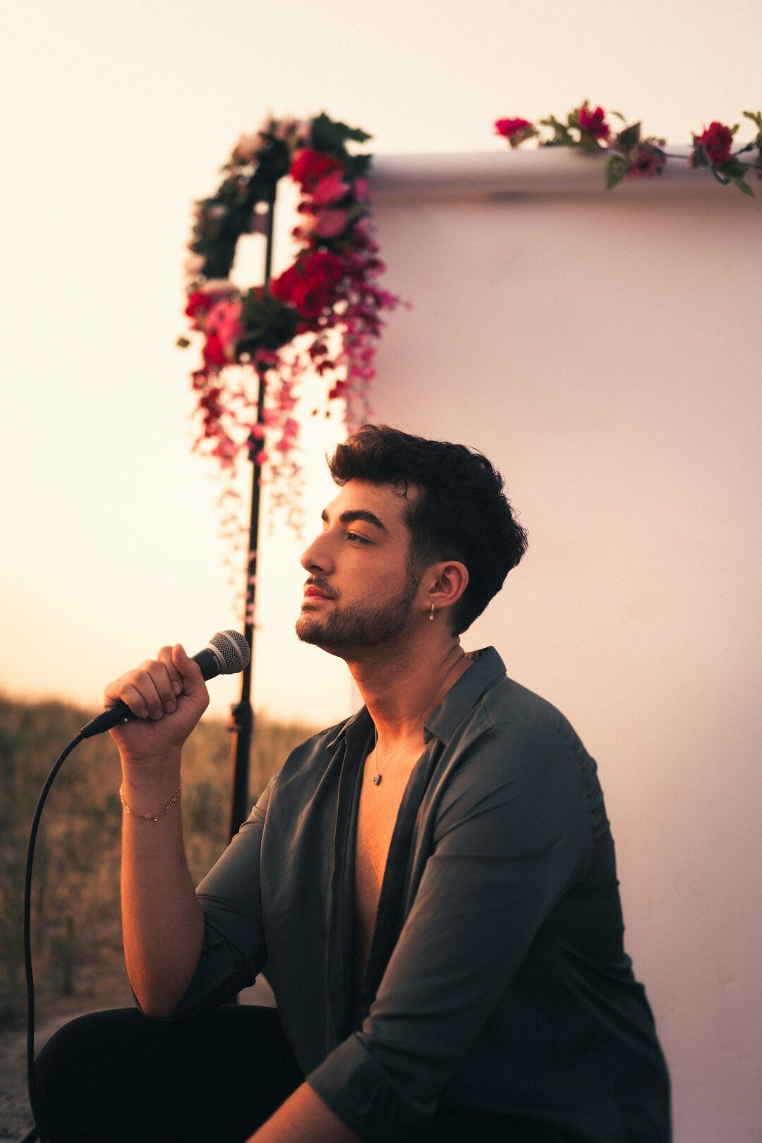 man singing passionately